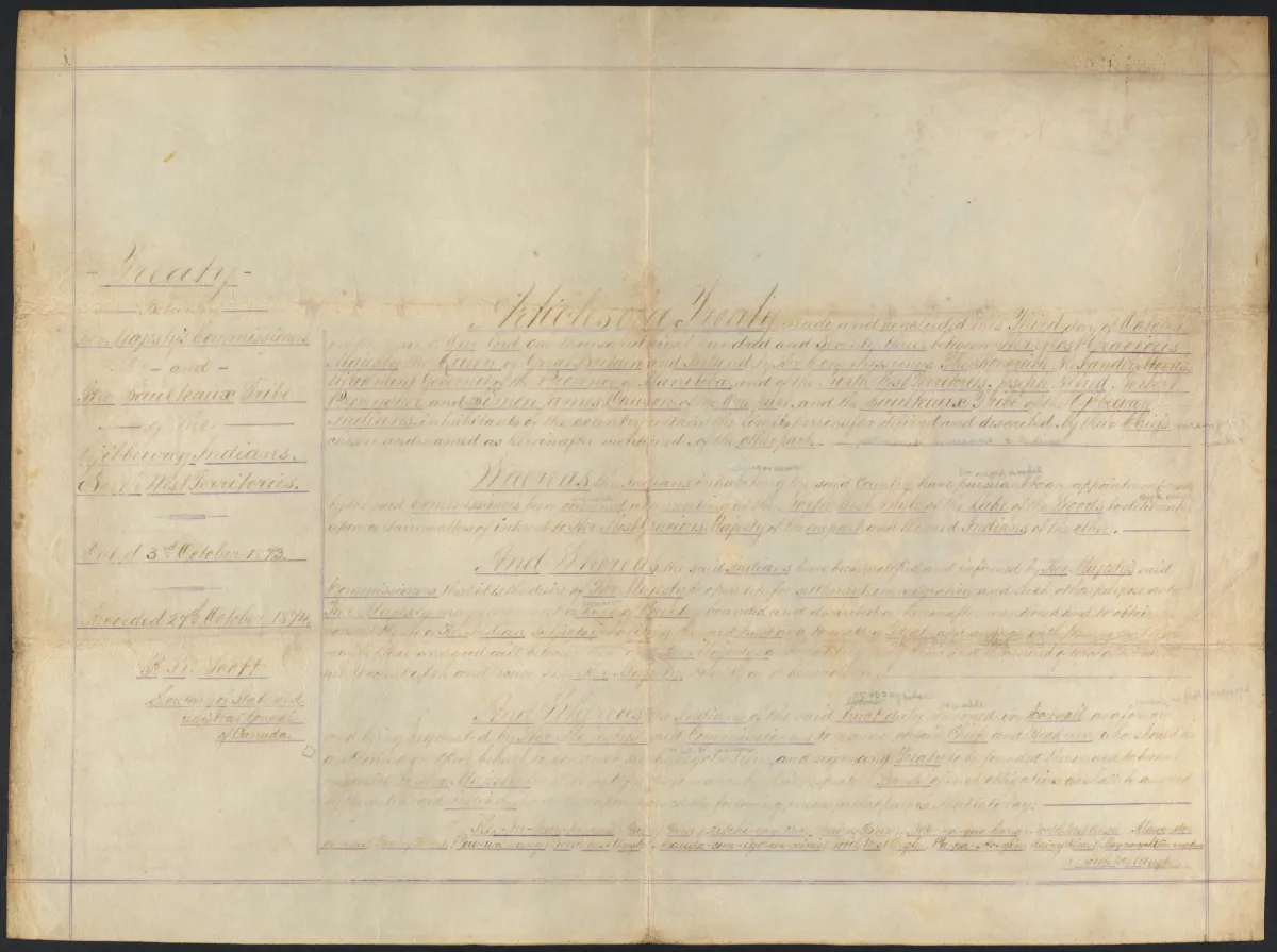 Un parchemin jaunâtre rempli en grande partie de texte manuscrit.